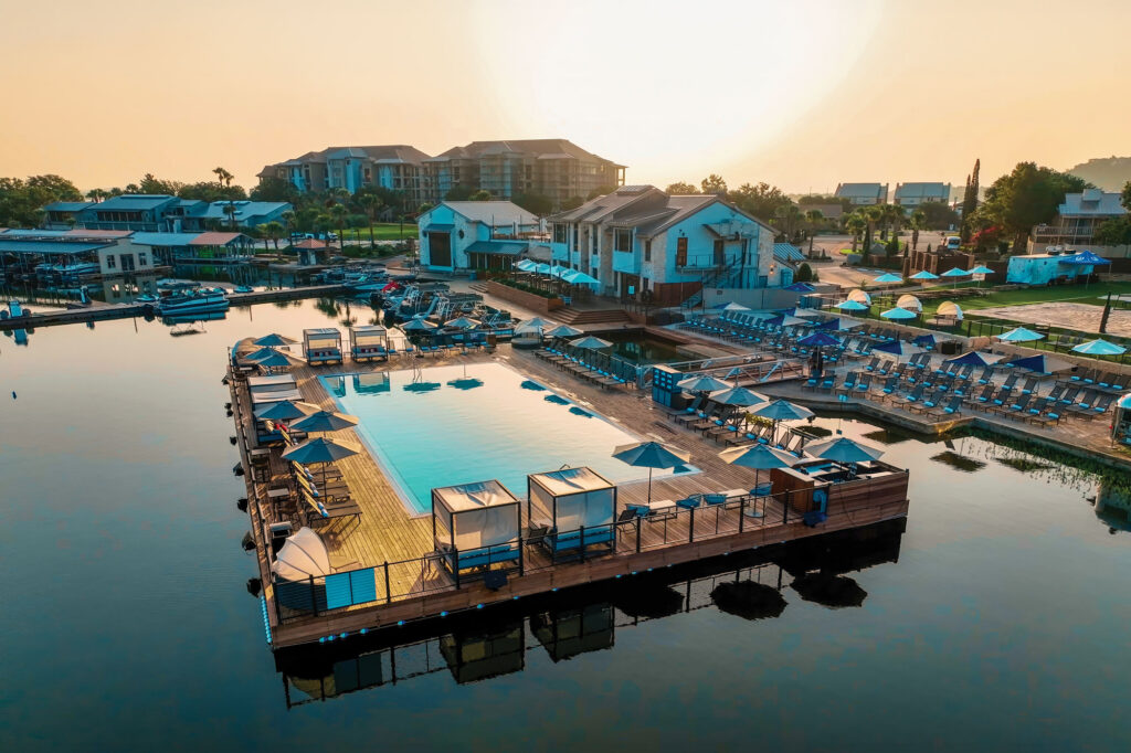  The floating pool is just one of many attractions for guests to enjoy throughout their visit. [Credit: Horseshoe Bay Resort]