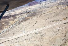 Fulcher Field, a gravel strip in Terlingua, is visible below the Luscombe’s right wing. [Credit: Hannah Gentiles]
